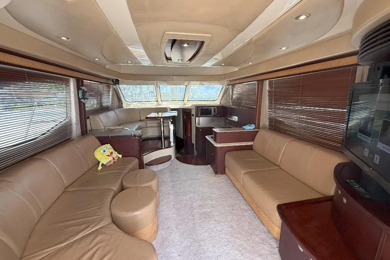  Yacht Photos Pics Luxurious interior of a 2005 Sea Ray 500 Sedan Bridge yacht with plush seating and modern amenities.