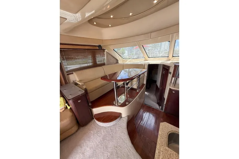  Yacht Photos Pics Luxurious interior of 2005 Sea Ray 500 Sedan Bridge yacht with elegant seating and wood finishes.