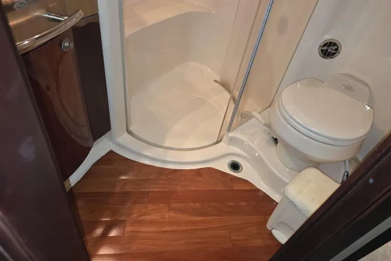  Yacht Photos Pics Bathroom interior of 2005 Sea Ray 500 Sedan Bridge yacht with shower and toilet.