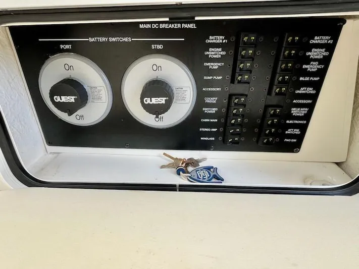  Yacht Photos Pics Main DC breaker panel on 2012 Sea Ray 330 Sundancer with keys placed on it.