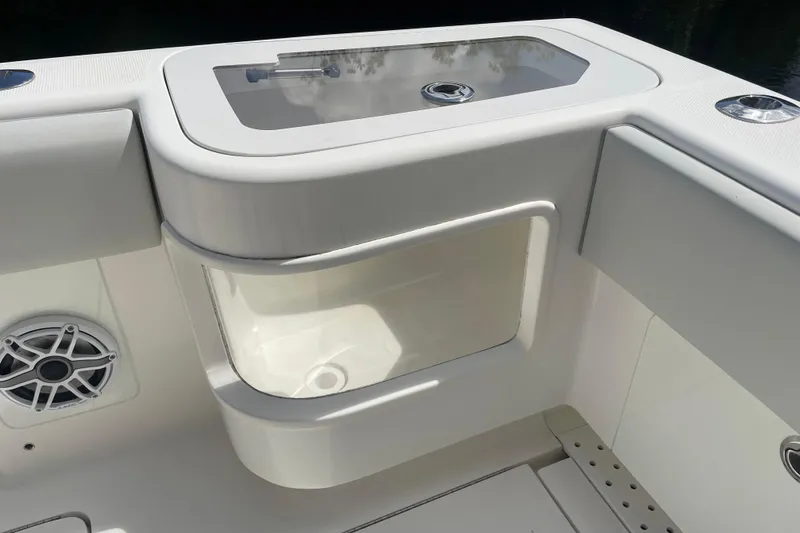  Yacht Photos Pics 2022 SeaVee 370z boat interior with storage compartment and speaker detail.