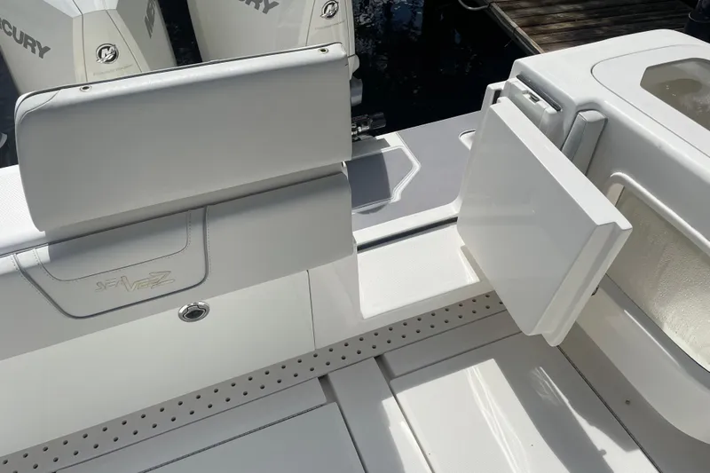  Yacht Photos Pics 2022 SeaVee 370z boat interior with seating and storage compartments.