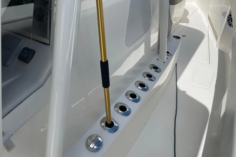 Yacht Photos Pics 2022 SeaVee 370z boat deck with rod holders and sleek design.