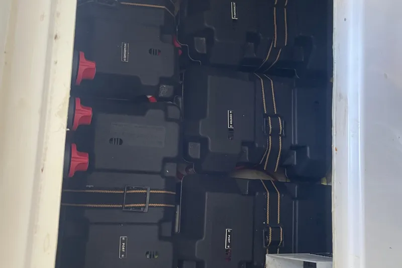  Yacht Photos Pics Battery compartment of 2022 SeaVee 370z boat with secured black battery boxes.