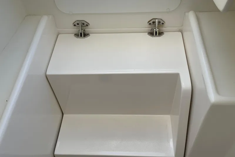  Yacht Photos Pics 2022 SeaVee 370z boat interior step with white finish and metal hinges.