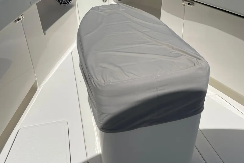  Yacht Photos Pics Covered seat on 2022 SeaVee 370z boat deck, showcasing sleek design.