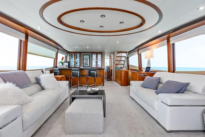 Voyager Yacht Photos Pics Luxurious interior of 2006 Lazzara Skylounge yacht with elegant seating and ocean views.