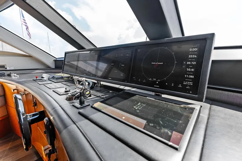 Voyager Yacht Photos Pics Control panel of 2006 Lazzara Skylounge yacht with advanced navigation displays.