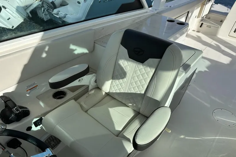  Yacht Photos Pics Luxury seating on 2023 Sailfish 316 DC boat, featuring premium upholstery and armrests.