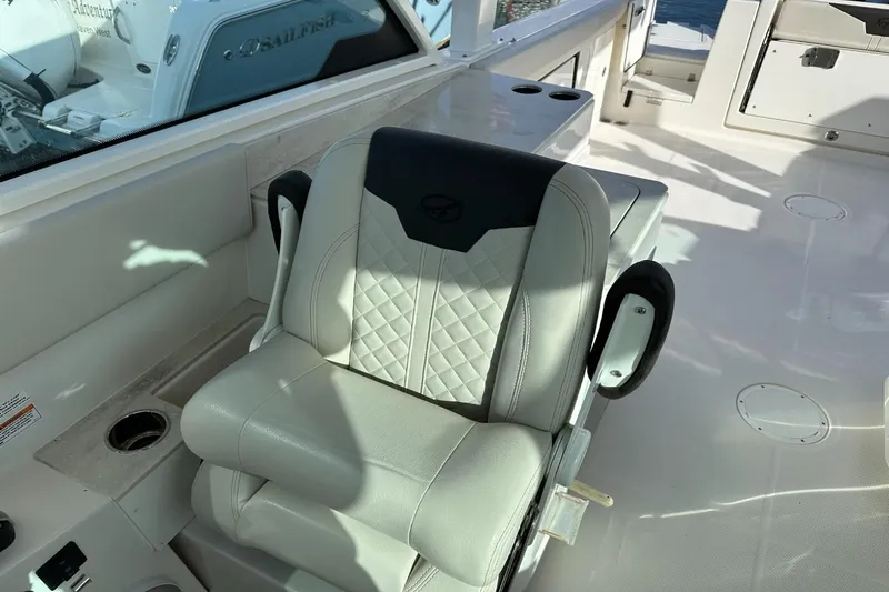  Yacht Photos Pics Luxury seating on 2023 Sailfish 316 DC boat, featuring premium upholstery and armrests.