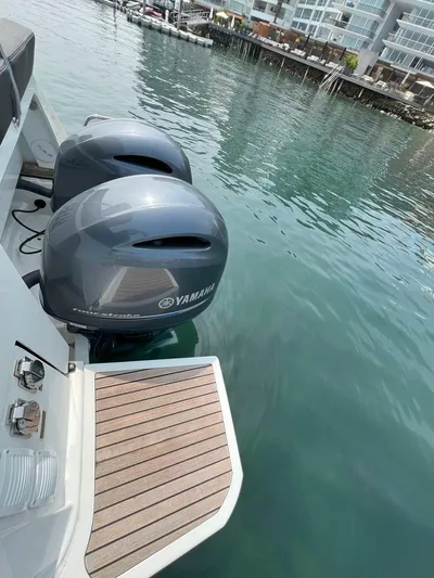 Marea Yacht Photos Pics 2019 Jeanneau Merry Fisher 895 with Yamaha outboard engines docked by waterfront.
