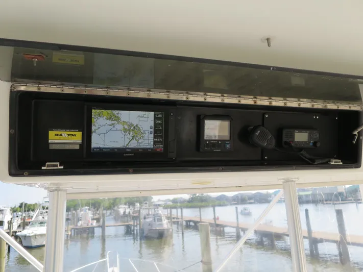 High Risk Yacht Photos Pics Navigation equipment on 1997 Post 50 Flybridge yacht, docked at marina.