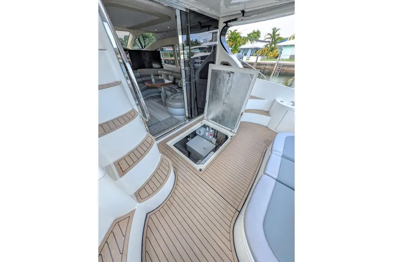  Yacht Photos Pics Luxurious 2001 Azimut 46 yacht interior with open hatch and elegant seating area.