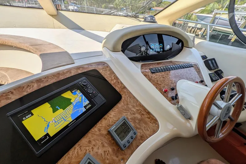  Yacht Photos Pics Helm of 2001 Azimut 46 yacht with navigation and control systems.