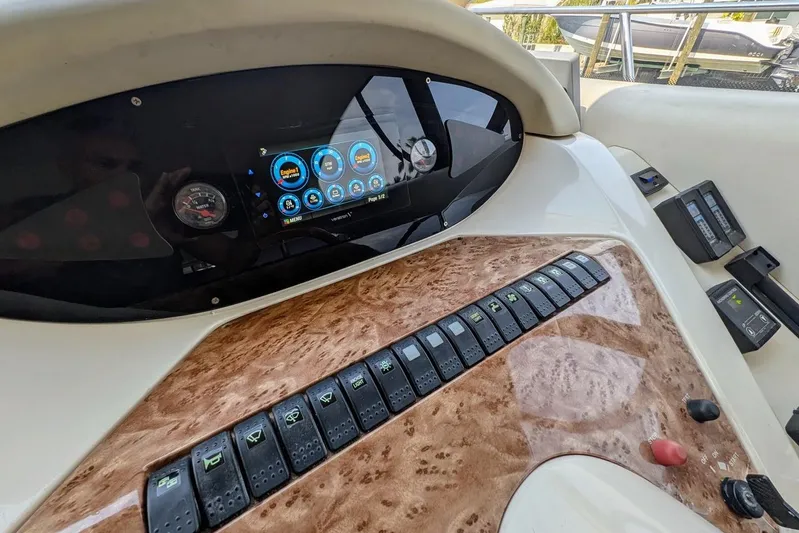  Yacht Photos Pics Control panel of a 2001 Azimut 46 yacht with digital display and switches.