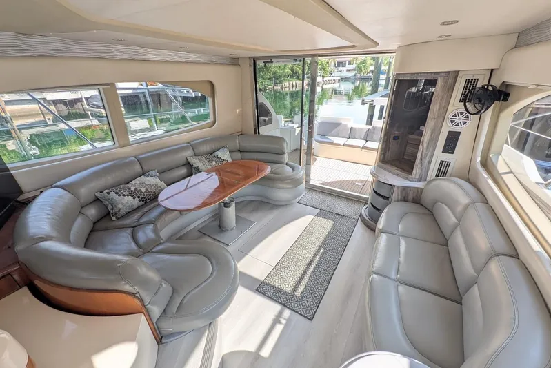  Yacht Photos Pics Luxurious interior of 2001 Azimut 46 yacht with leather seating and wooden table.