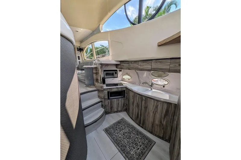  Yacht Photos Pics Luxurious interior of 2001 Azimut 46 yacht with modern kitchen and elegant design.