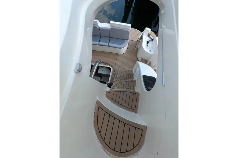  Yacht Photos Pics Staircase and seating area on 2001 Azimut 46 yacht with wooden deck.