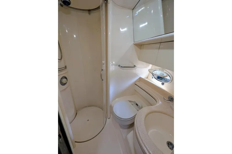  Yacht Photos Pics Bathroom interior of 2001 Azimut 46 yacht, featuring shower, sink, and toilet.