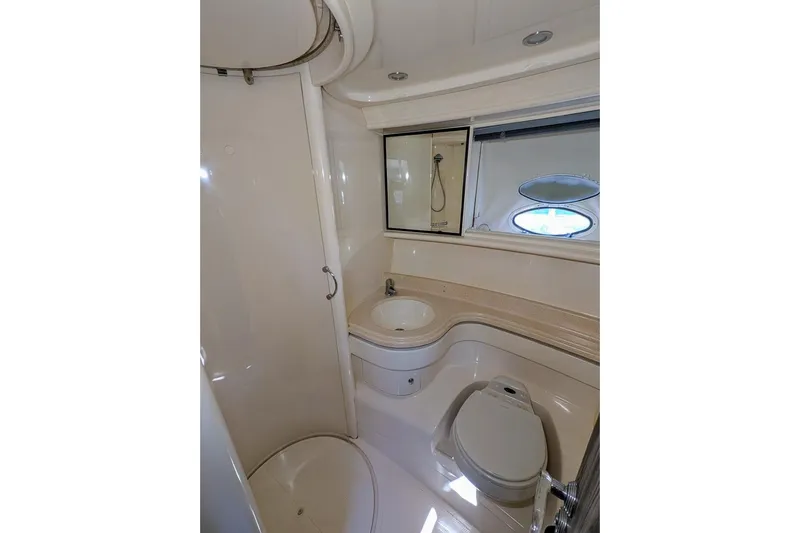  Yacht Photos Pics Bathroom interior of 2001 Azimut 46 yacht with shower, sink, and toilet.