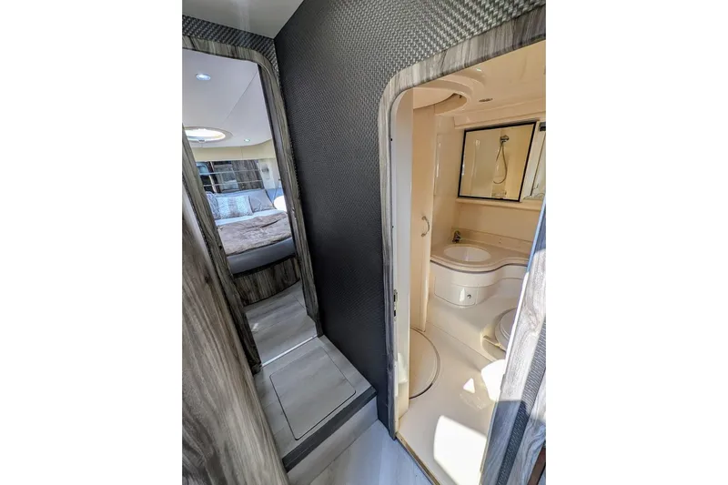  Yacht Photos Pics Interior of 2001 Azimut 46 yacht showing bathroom and bedroom.