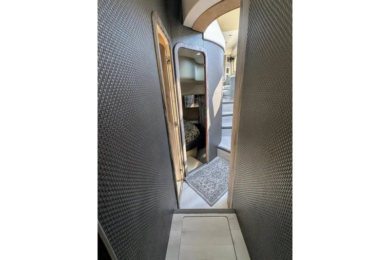  Yacht Photos Pics Interior hallway of 2001 Azimut 46 yacht with modern design and textured walls.