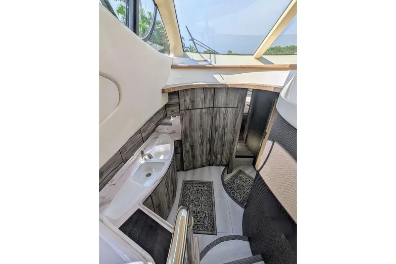  Yacht Photos Pics Interior of 2001 Azimut 46 yacht, featuring modern design and compact sink area.