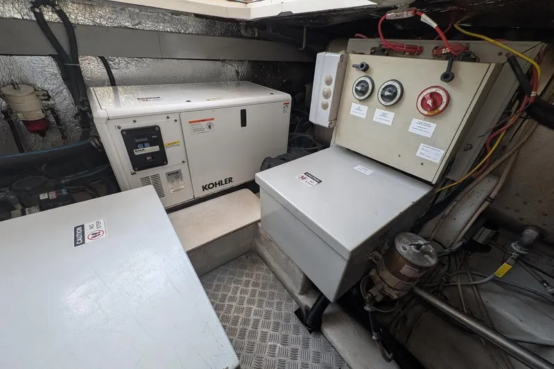  Yacht Photos Pics Engine room of a 2001 Azimut 46 yacht with Kohler generator and control panel.
