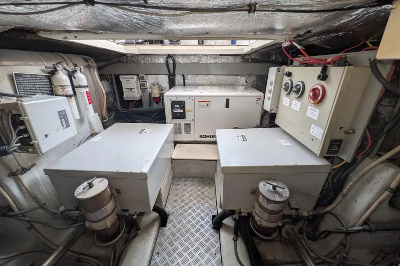  Yacht Photos Pics Engine room of a 2001 Azimut 46 yacht with Kohler generator and control panels.