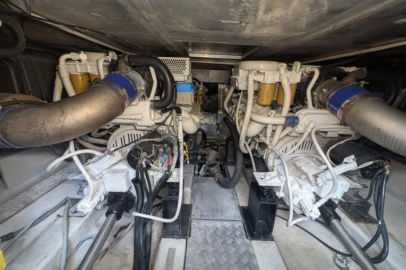  Yacht Photos Pics Engine room of a 2001 Azimut 46 yacht, showcasing dual engines and mechanical components.