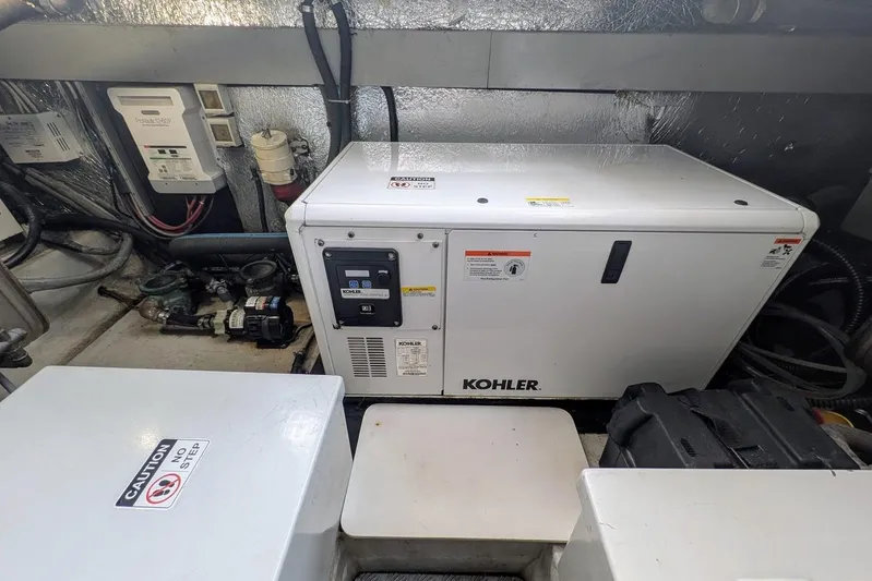  Yacht Photos Pics Engine room of 2001 Azimut 46 yacht featuring Kohler generator.