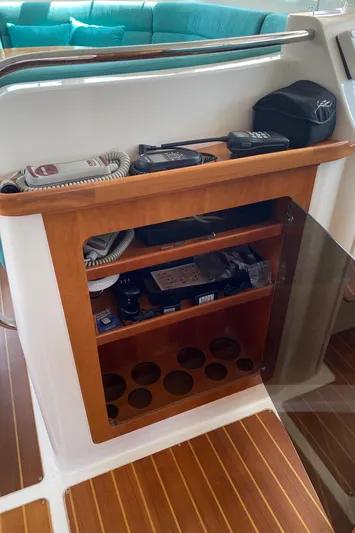 Magic Yacht Photos Pics Wooden helm station with navigation equipment on PDQ MV-41, 2008 model.