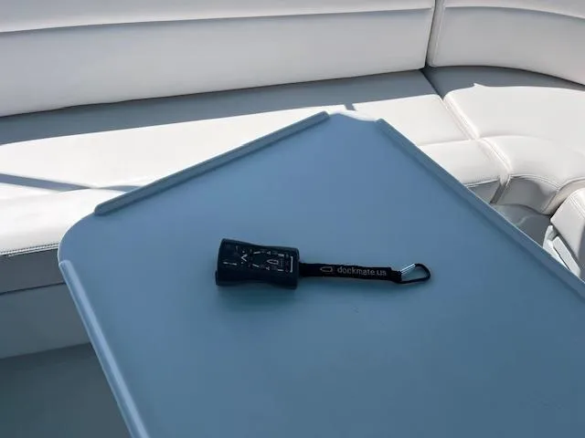 Magic Yacht Photos Pics Remote control on a PDQ MV-41 boat table, 2008 model, with white seating.