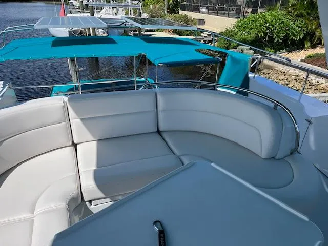 Magic Yacht Photos Pics Luxury seating on a PDQ MV-41 yacht, 2008 model, docked by the water.