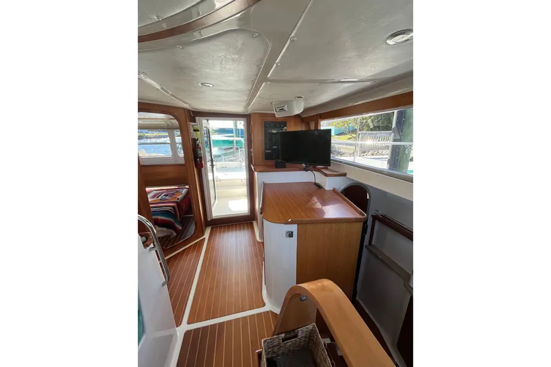 Magic Yacht Photos Pics Interior of 2008 PDQ MV-41 boat with wood flooring and modern amenities.