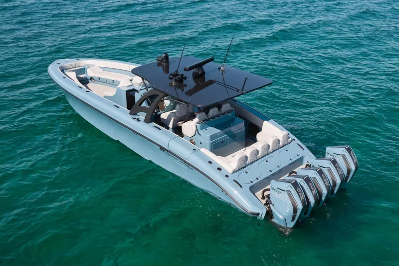 Yacht Photos Pics 2023 Midnight Express 43' Open boat with multiple engines on clear blue water.