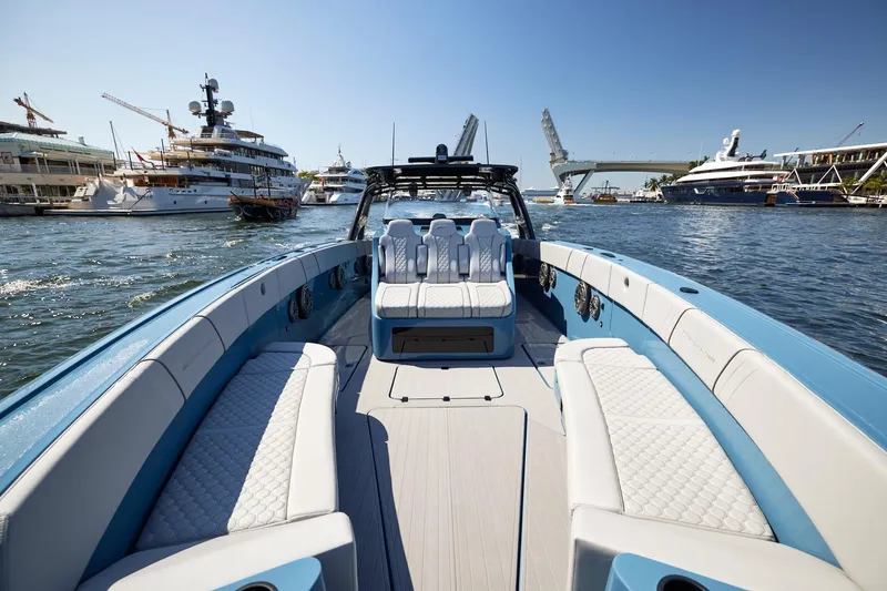  Yacht Photos Pics 2023 Midnight Express 43' Open boat in marina, featuring luxurious seating and modern design.