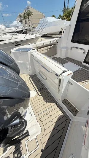  Yacht Photos Pics 2026 Cutwater C-288 Coupe boat deck with modern design and dual engines.