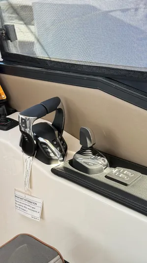  Yacht Photos Pics 2026 Cutwater C-288 Coupe control panel with throttle and joystick.