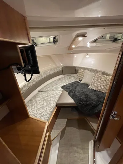  Yacht Photos Pics 2026 Cutwater C-288 Coupe interior cabin with cozy seating and modern design.