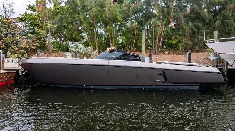  Yacht Photos Pics 2015 CNM 43 Continental yacht docked by lush greenery.