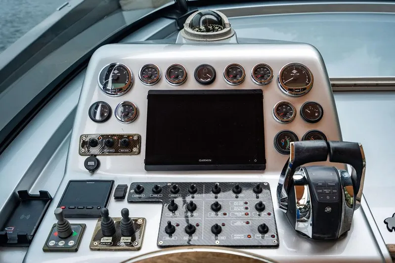  Yacht Photos Pics Control panel of a 2015 CNM 43 Continental yacht with gauges and navigation equipment.