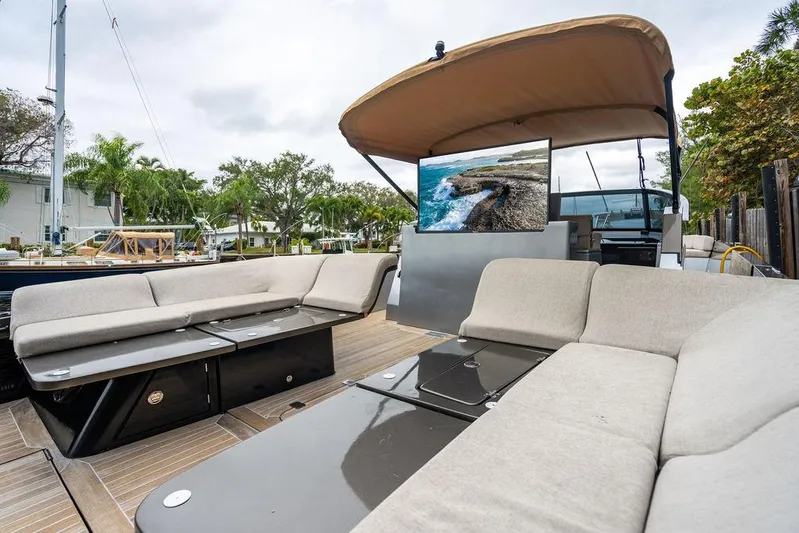  Yacht Photos Pics Luxurious 2015 CNM 43 Continental yacht with spacious outdoor seating and modern amenities.