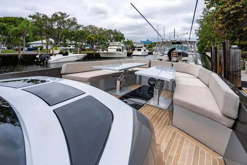  Yacht Photos Pics Luxurious 2015 CNM 43 Continental yacht with spacious deck and modern seating area.