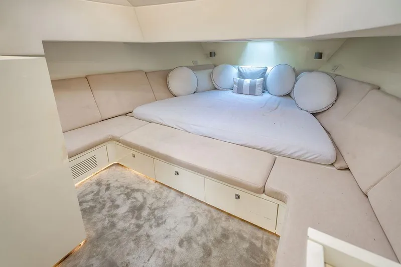  Yacht Photos Pics Luxurious interior of 2015 CNM 43 Continental yacht with plush seating and elegant bedding.