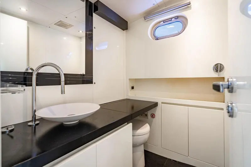  Yacht Photos Pics Luxurious bathroom in 2015 CNM 43 Continental yacht with modern fixtures and sleek design.