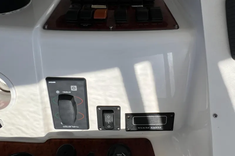 Sunflower Yacht Photos Pics Control panel of a 2002 Silverton 453 Motor Yacht with various switches and labels.