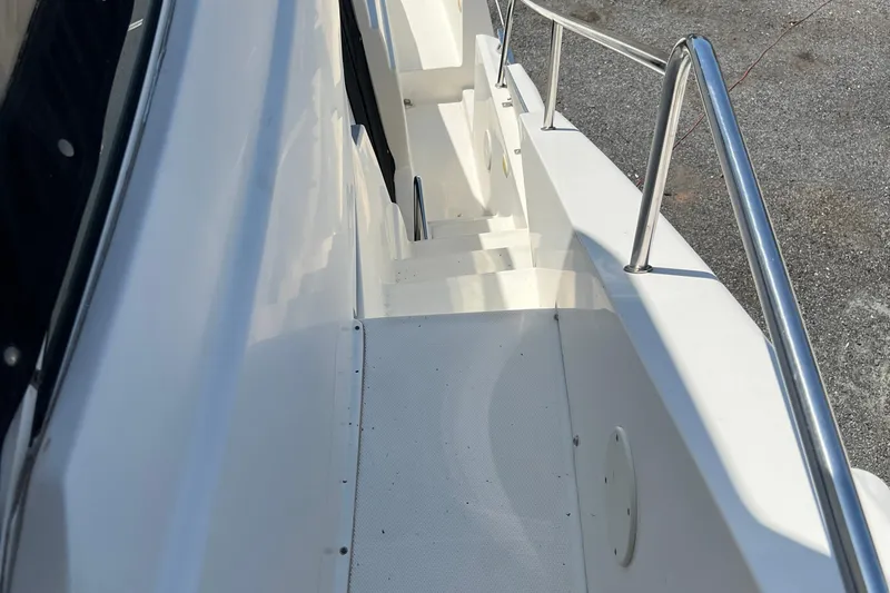 Sunflower Yacht Photos Pics Stairway on 2002 Silverton 453 Motor Yacht with stainless steel railing.