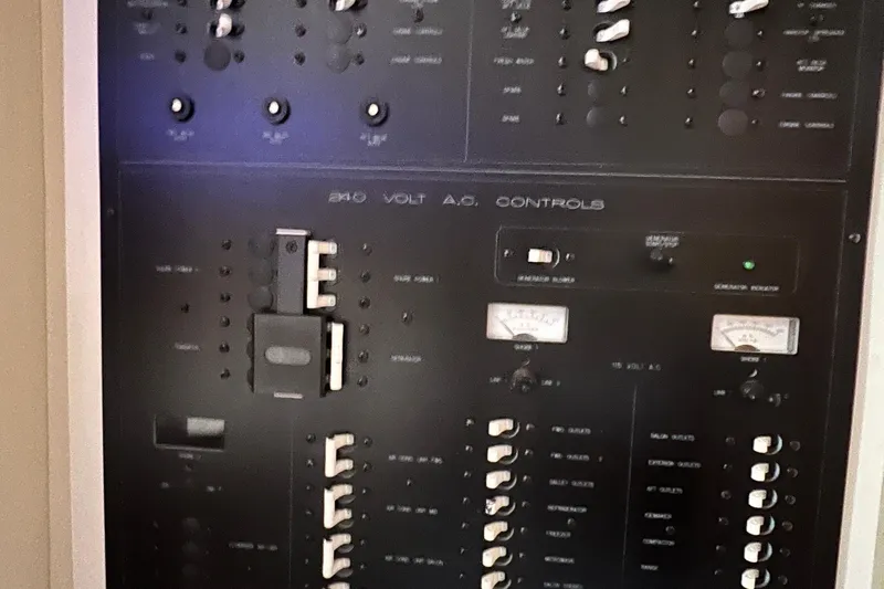 Sunflower Yacht Photos Pics Control panel of a 2002 Silverton 453 Motor Yacht, featuring 240-volt AC controls.