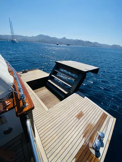  Yacht Photos Pics 2014 Ada Yacht Steel Trawler with open swim platform on calm sea.